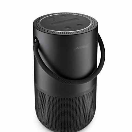 Black portable speaker with handle on a white background